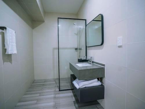 Koupelna v ubytování Taufusi Hotel
