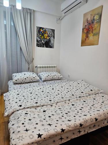 Katil atau katil-katil dalam bilik di The Wazaari Apartment
