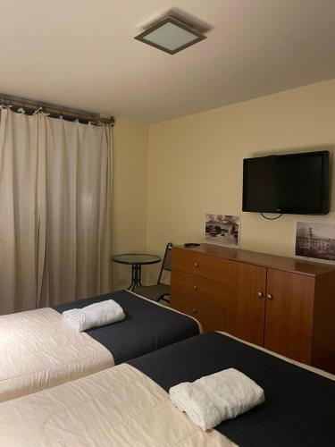 Hotel Piru Wasiにあるベッド