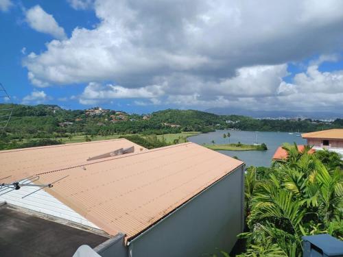 a view of a river from a house at Kasa Créole in Les Trois-Îlets