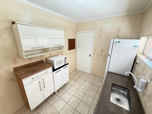 Dapur atau dapur kecil di Pé na Areia Praia do Canto do Forte IV