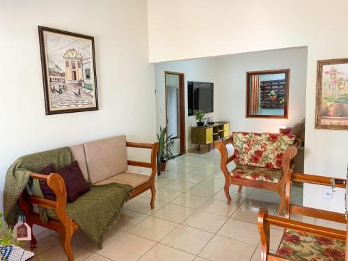 TV a/nebo společenská místnost v ubytování Casa da Mangueira casa completa no centro histórico de Goiás