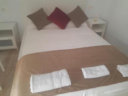 En eller flere senge i et værelse på Aurora3 Vandelvira - Alojamiento casco histórico