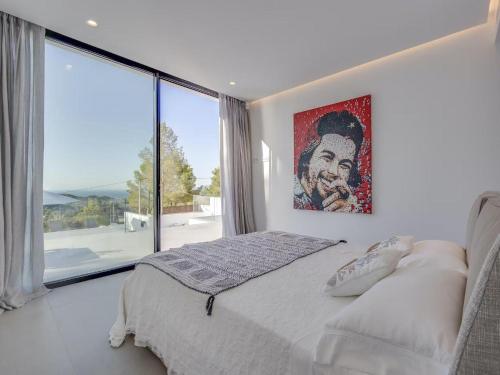 Ένα ή περισσότερα κρεβάτια σε δωμάτιο στο Villa in Ibiza with Stunning Sea Views