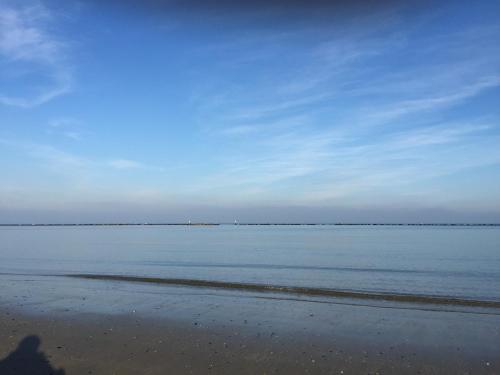 a view of the ocean from the beach at Long Beach Village Residence sul mare spiaggia privata inclusa in Lido Adriano