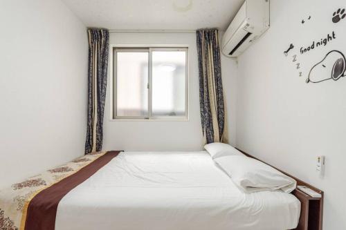 Postel nebo postele na pokoji v ubytování 山手線田端駅から徒歩5分、とても便利な場所です