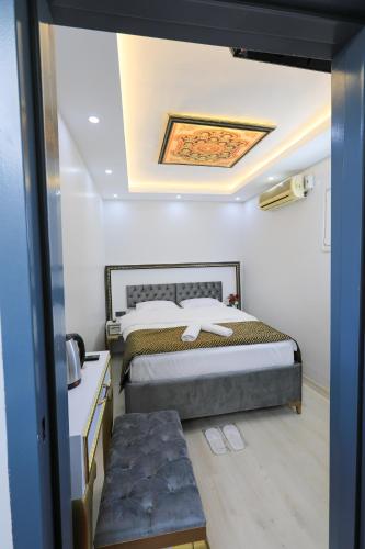 a bedroom with a bed in a room at Istanbul Hotel&Guesthouse in Istanbul