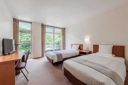 Μια τηλεόραση ή/και κέντρο ψυχαγωγίας στο Kamenoi Hotel Tsukubasan