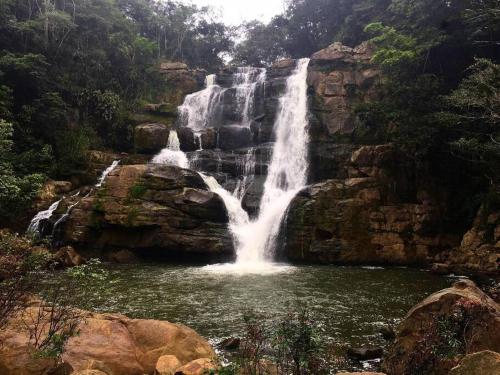 a waterfall in the middle of a pool of water at Apartamento en Guaduas 2 habitaciones 4 camas in Guaduas