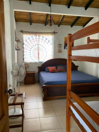 Letto o letti in una camera di Cabaña Cangrejito Olon