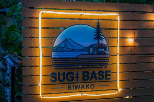 a sign for a ski lodge with a picture of a house at SUGI BASE Biwako in Otsu