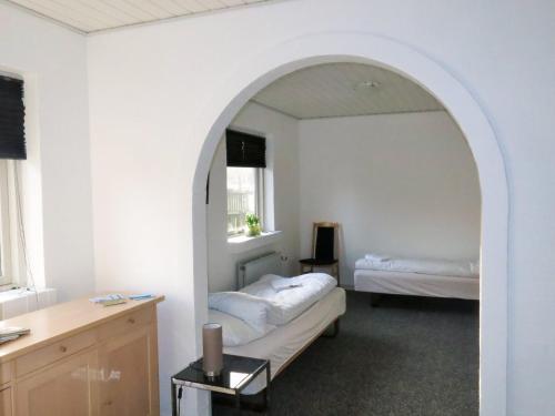 Postel nebo postele na pokoji v ubytování Centrum Sleepover