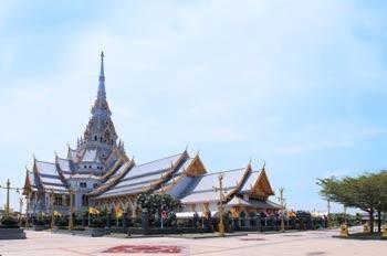 a large building with a tower on top of it at JK LIVING Hotel And Service Apartment in Chachoengsao