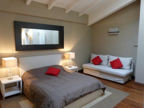 En eller flere senge i et værelse på Residenza Porta D'Azeglio