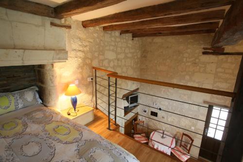 Ένα ή περισσότερα κρεβάτια σε δωμάτιο στο Le Clos de la Garde