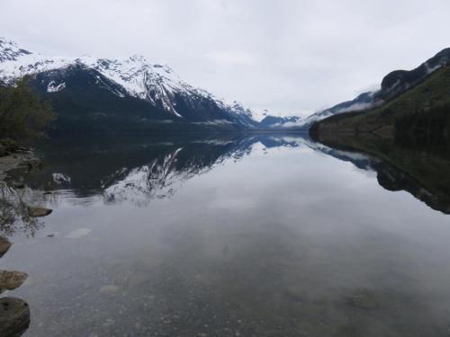 a body of water with a snow covered mountain at Suite 2 Lynn View Lodge in Haines