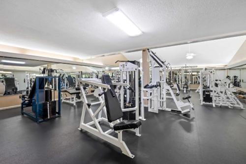 a gym with a lot of equipment in a room at Quality Inn Morgan City in Morgan City