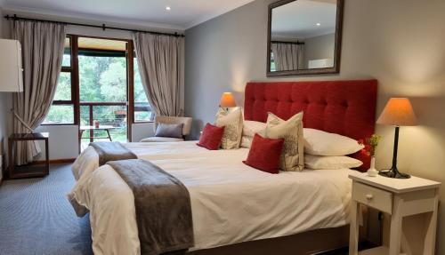 Postel nebo postele na pokoji v ubytování Pumula Lodge 4 Star Guesthouse Knysna