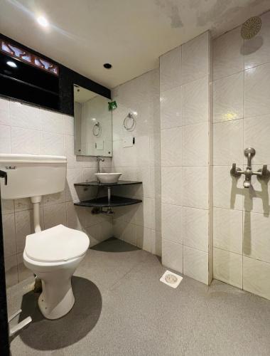 Koupelna v ubytování Hotel Shripad
