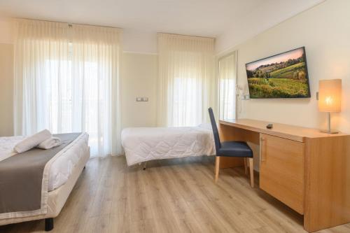 Cama o camas de una habitación en Atlas Hotel