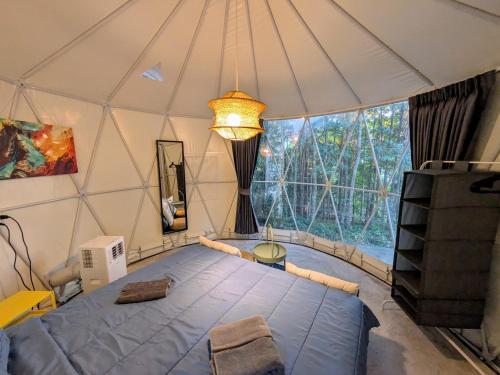 Postel nebo postele na pokoji v ubytování Vanara Bungalows