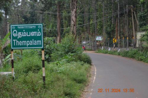 a street sign on the side of a road at SS Tiny Home Stays in Kolli Hills
