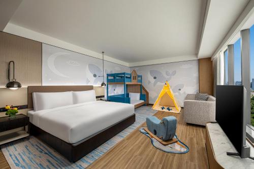 Postel nebo postele na pokoji v ubytování Crowne Plaza Sanya Yazhou Bay by IHG