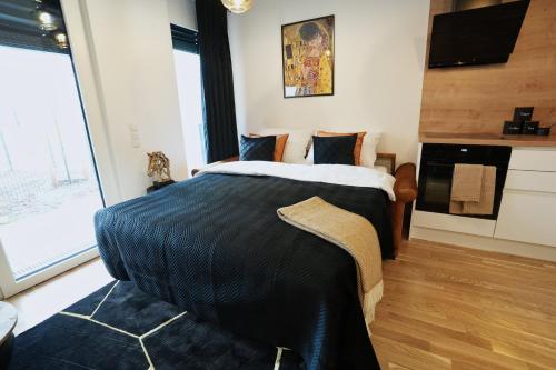 Ένα ή περισσότερα κρεβάτια σε δωμάτιο στο "Carl's Design Residences" - Your family-friendly, urban & stylish Oasis in Vienna l free parking & great access