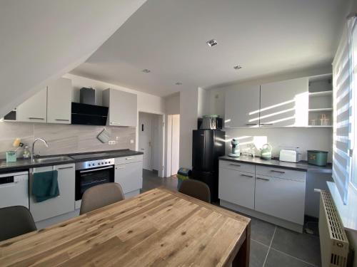 Kuchyň nebo kuchyňský kout v ubytování Apartment Zausel