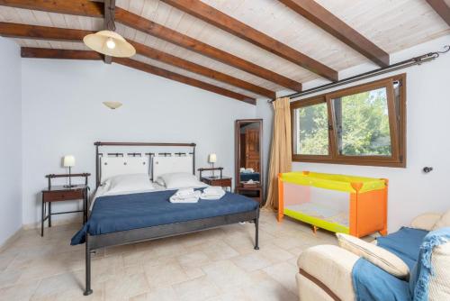 Ένα ή περισσότερα κρεβάτια σε δωμάτιο στο Villa Zacharenia