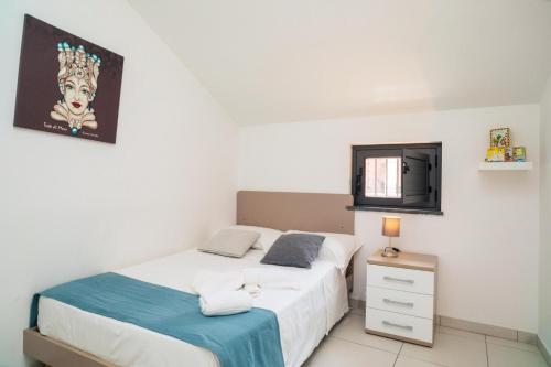 Postel nebo postele na pokoji v ubytování mungiBEDdu Apartment