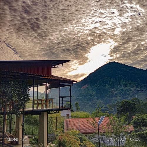 a building with a view of a mountain at The Cubes Ella in Ella