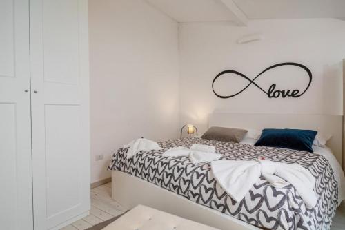 Postel nebo postele na pokoji v ubytování mungiBEDdu Apartment