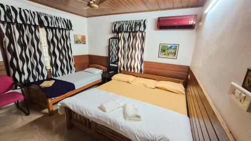 Postel nebo postele na pokoji v ubytování Honolulu Home