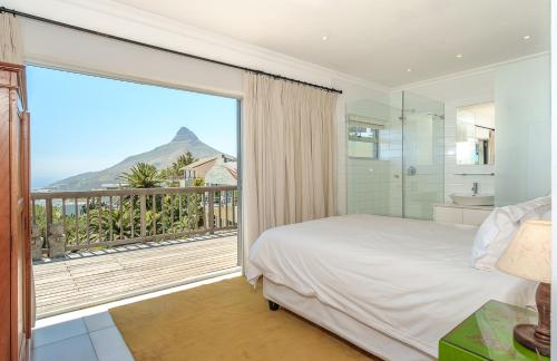 En eller flere senge i et værelse på Kettle's Guesthouse