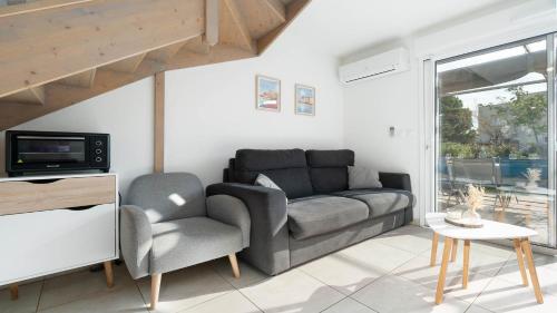 Photo de la galerie de l'établissement La Dune 49 - Villa 3P4, à Valras-Plage