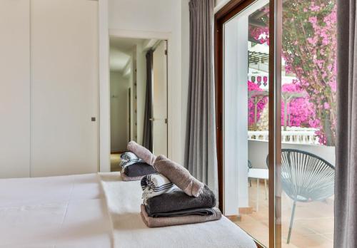 Katil atau katil-katil dalam bilik di Mijas Residence