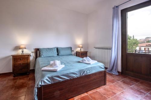 Giường trong phòng chung tại Casa Doriana
