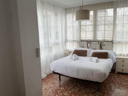 Ένα ή περισσότερα κρεβάτια σε δωμάτιο στο Hostal San Miguel by Croma