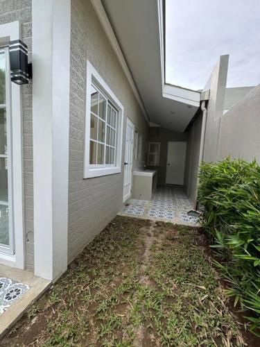 an empty hallway of a house with a window at Casa Leonardo-Bel Air 4 in Santa Rosa