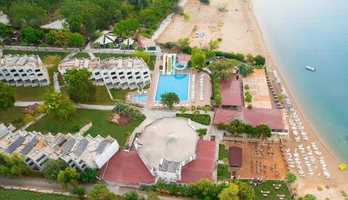 an aerial view of a resort next to a beach at Maya World Didyma Hotel in Didim