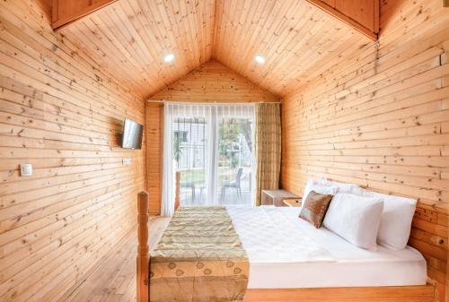 Postel nebo postele na pokoji v ubytování Maya World Didyma Hotel