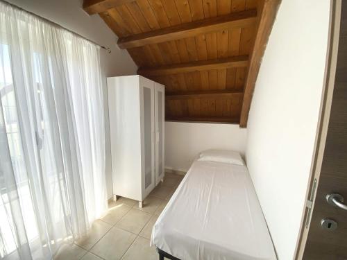 Katil atau katil-katil dalam bilik di Isca Calabretta Apartments M29