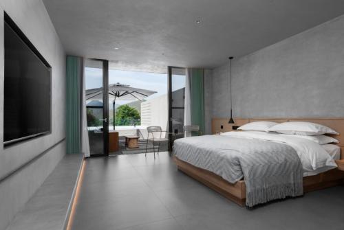 Fotografie z fotogalerie ubytování Huangguoshu Duobei Yunshe Hotel v destinaci Xinggong