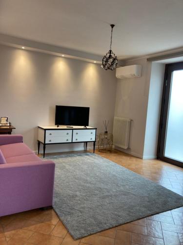 TV a/nebo společenská místnost v ubytování Residenza Le Fornaci