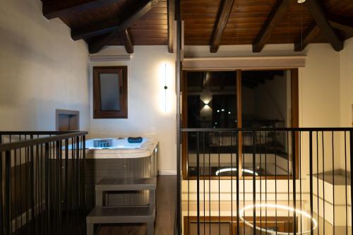 a bathroom with a sink and a mirror at Thea Petra in Kalabaka