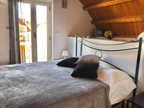 Postel nebo postele na pokoji v ubytování Isca Calabretta Apartments M2