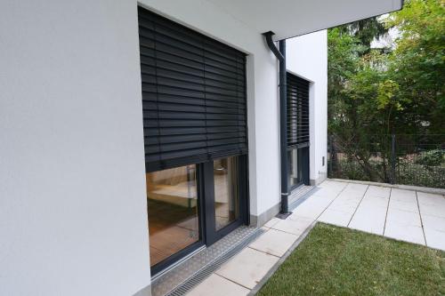 Κήπος έξω από το "Carl's Design Residences" - Your family-friendly, urban & stylish Oasis in Vienna l free parking & great access
