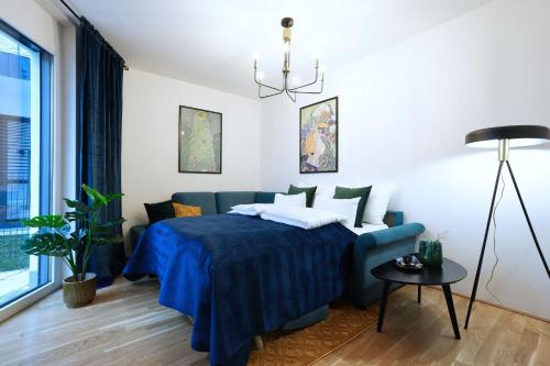 Ένα ή περισσότερα κρεβάτια σε δωμάτιο στο "Carl's Design Residences" - Your family-friendly, urban & stylish Oasis in Vienna l free parking & great access