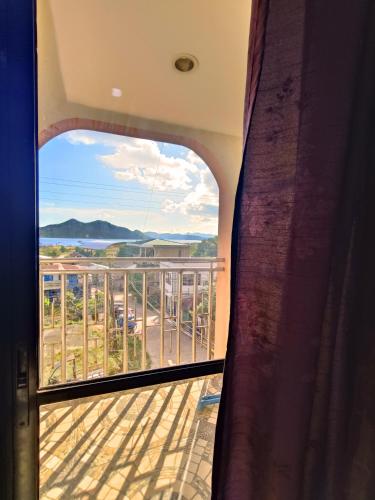 a view from a balcony with a view of the ocean at R2R Bayview Inn in Coron